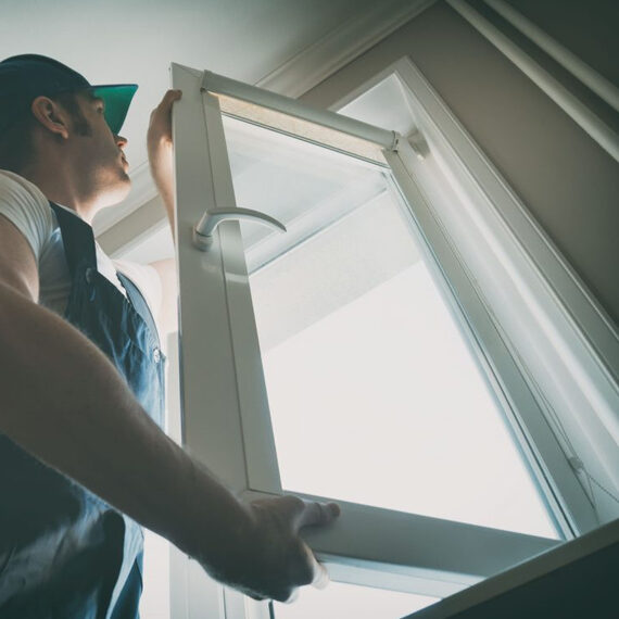 Seal Glass fitter installing a bright uPVC window